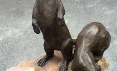 Restored resin and plaster otter sculpture - glued tail, feet and paws Restored resin and plaster otter sculpture - glued tail, feet and paws