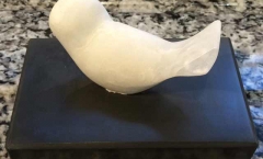 White alabaster dove - new tail tip - installed on new slate plinth White alabaster dove - new tail tip - installed on new slate plinth
